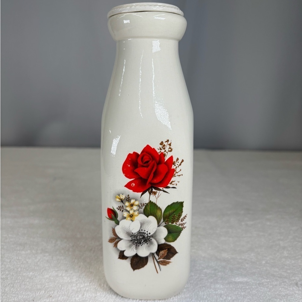 Vintage ceramic floral milk bottle